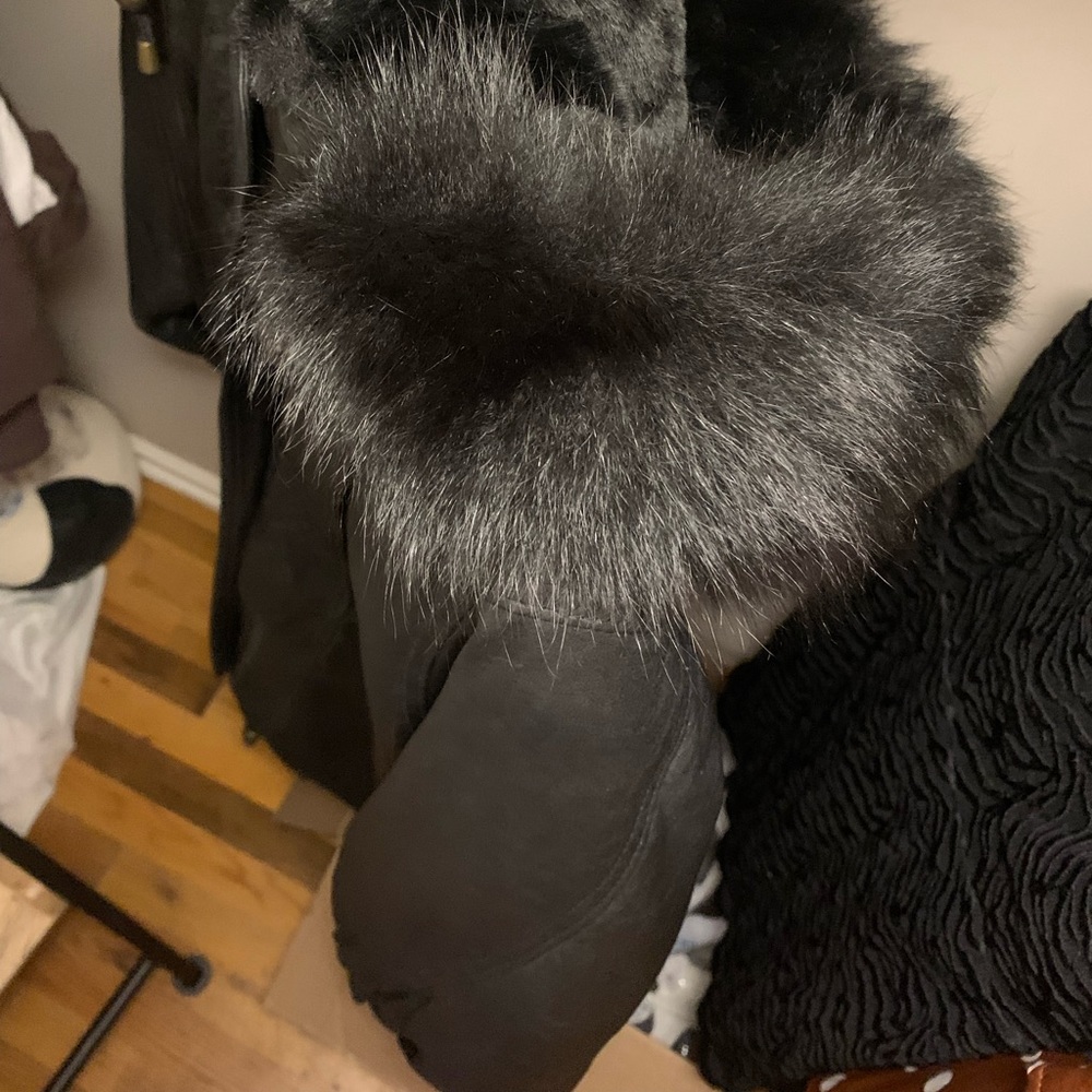 Rare real fox fur lined leather coat. Very warm and traditional looking. Unisex